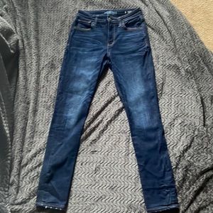 skinny high rise jeans with detailing on the bottom
